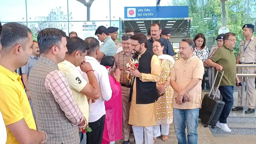 Union Minister Anurag Thakur today at Kangra airport being welcomed by BJP workers.