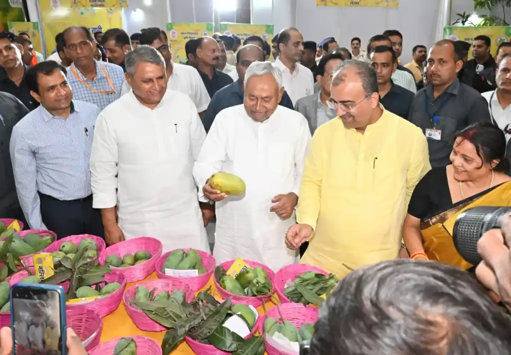 Chief Minister Nitish Kumar seen inspecting a variety of Mango in an exhibition in Patna.