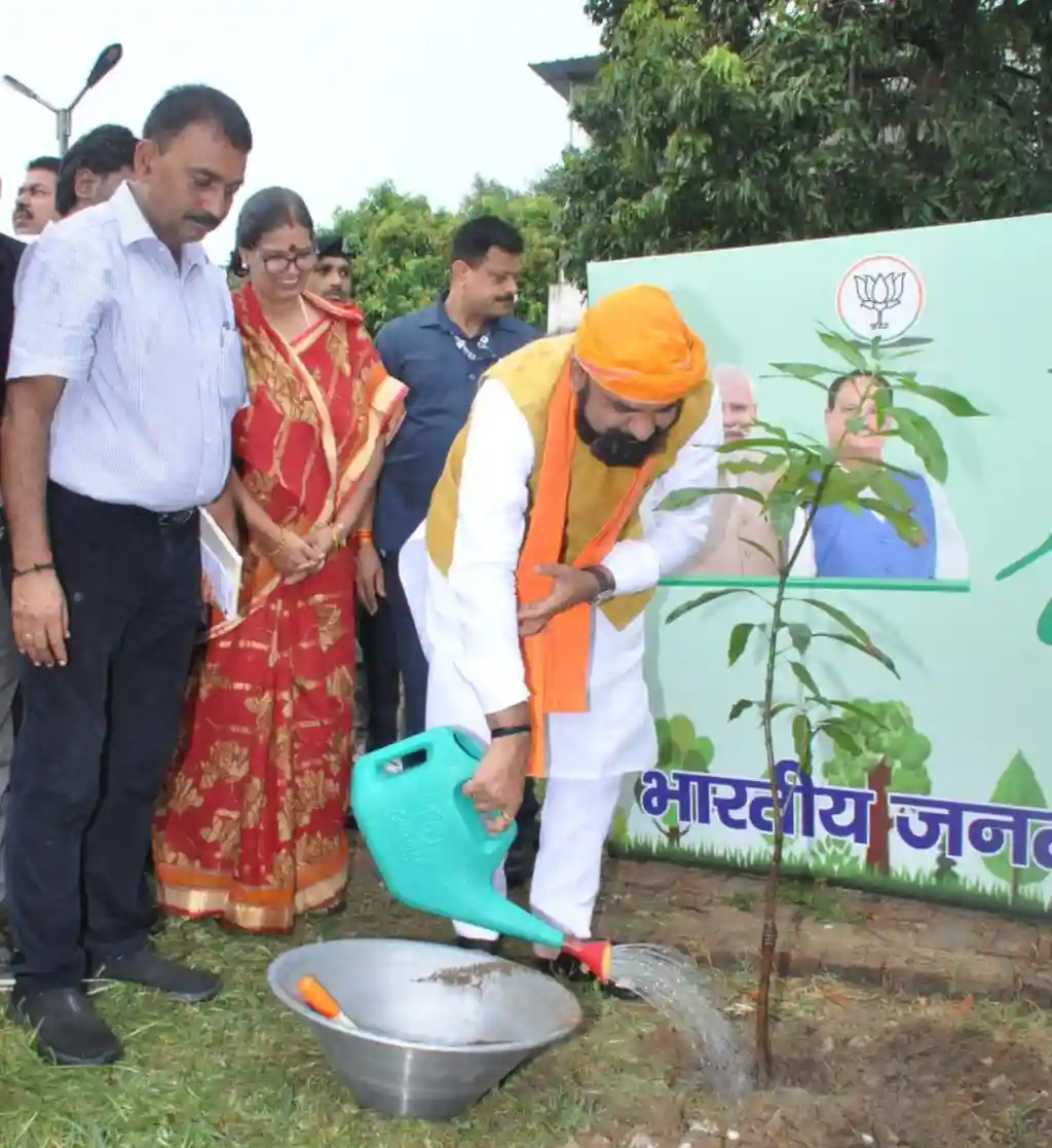 Deputy Chief Minister of Bihar Samrat Choudhary watering a sapling under the nationwide campaign "Ek Ped Maa Ke Naam".